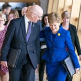 John Swinney and Nicola Sturgeon pictured in Holyrood in 2023