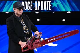 Elon Musk wields a chainsaw while give a 'Doge update' at the annual Conservative Political Action Conference last month (Picture: Saul Loeb)