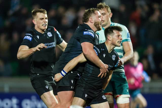 Warriors' George Horne (R) celebrates scoring his side's first try during the win over Munster. (Photo by Calum Chittleburgh / SNS Group)