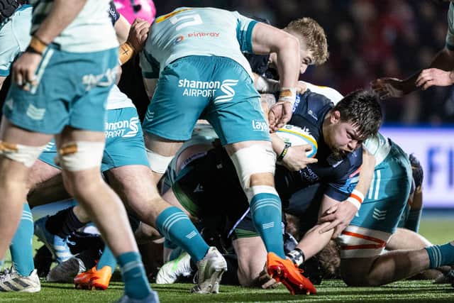 Warriors' Nathan McBeth (R) score his side's fourth and decisive try to secure victory over Munster at Scotstoun. (Photo by Ross MacDonald / SNS Group)