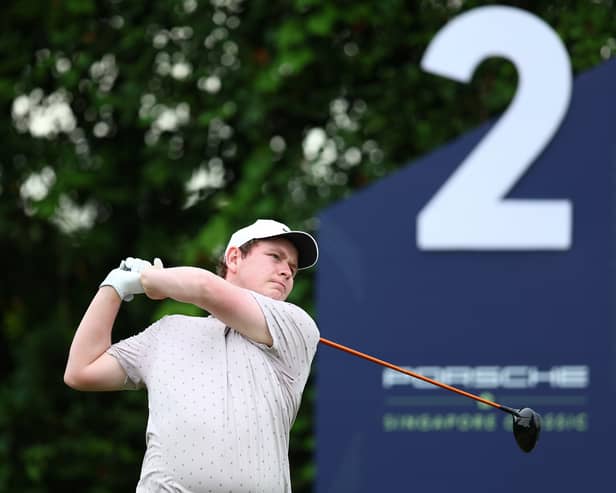 Bob MacIntyre of Scotland tees off on the second hole during the third and final round of the Porsche Singapore Classic at Laguna National Golf Resort Club 