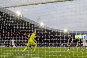 Scotland keeper Craig Gordon watches on helplessly as Konstantinos Karetsas scores Greece's second goal at Hampden.