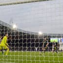 Scotland keeper Craig Gordon watches on helplessly as Konstantinos Karetsas scores Greece's second goal at Hampden.