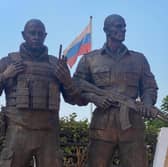 Bronze statues of the late Russian mercenary leader Yevgeny Prigozhin and his right-hand man Dmitru Utkin have just been erected outside the Maison Russe in Bangui, the capital of the Central African Republic (Picture: Annela Niamolo)