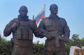 Bronze statues of the late Russian mercenary leader Yevgeny Prigozhin and his right-hand man Dmitru Utkin have just been erected outside the Maison Russe in Bangui, the capital of the Central African Republic (Picture: Annela Niamolo)