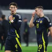 Scotland's Scott McTominay and Lewis Ferguson trudge off after the defeat by Greece.