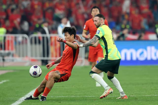 Hibs' Martin Boyle challenges for the ball during Australia's win over China.