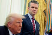 US Defence Secretary Pete Hegseth, seen with Donald Trump, discovered operational security was not quite as 'clean' as he thought (Picture: Anna Moneymaker)