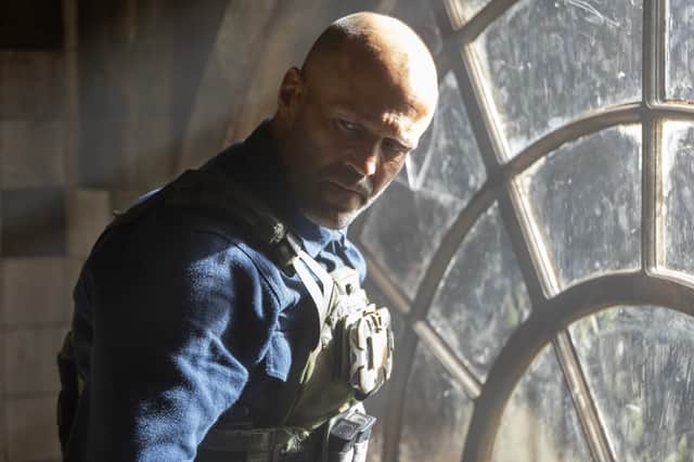 Jason Statham as Levon Cade in A Working Man