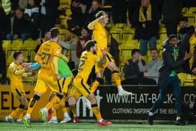 Andrew Shinnie celebrates his late winner for Livingston against Falkirk.
