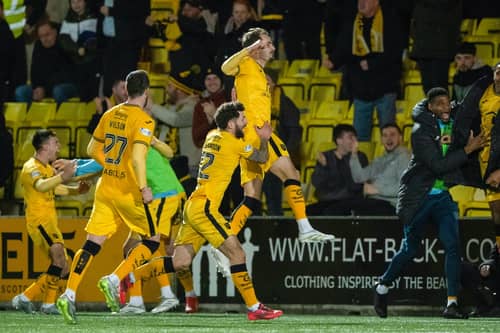 Andrew Shinnie celebrates his late winner for Livingston against Falkirk.