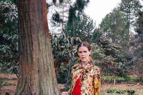 Linder at the Royal Botanic Gardens Edinburgh for EAF and Mount Stuart, 2025. Photo: Charlotte Cullen. Outfit: Ashish. Stylist: Rebecca Palmer. Make-up: Kala Williams. Courtesy the artist and EAF.