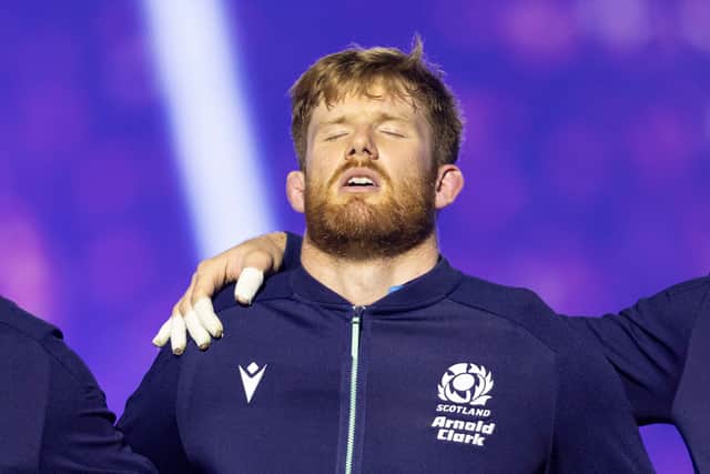 Gregor Brown during the anthems before the Guinness Six Nations match between France and Scotland at the Stade de France.