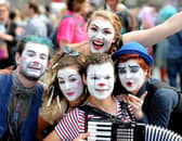 Fringe performers pose during a performance