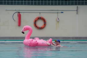 Margaret Holden with her flamingo inflatable.