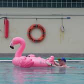 Margaret Holden with her flamingo inflatable.