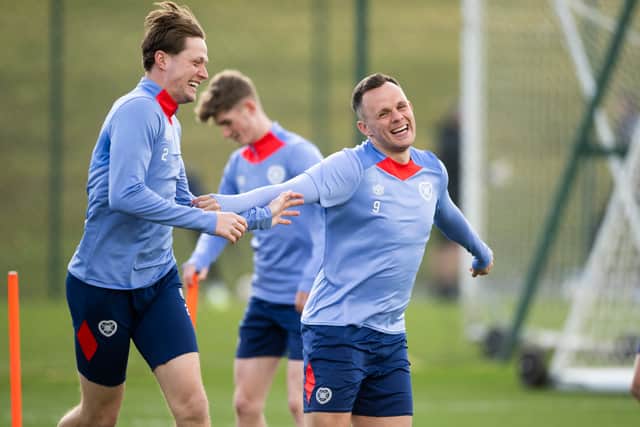Frankie Kent, left, is pictured back in Hearts training alongside Lawrence Shankland.