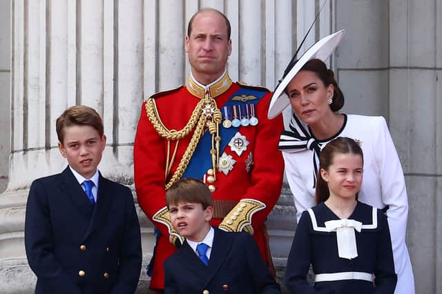 (L-R) Britain's Prince George of Wales, Britain's Prince William, Prince of Wales, Britain's Prince Louis of Wales, Britain's Catherine, Princess of Wales, and Britain's Princess Charlotte of Wales, stand on the balcony of Buckingham Palace after attending the King's Birthday Parade "Trooping the Colour" in London. Picture: AFP via Getty Images
