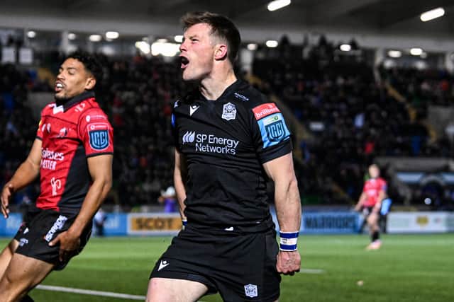 Glasgow's George Horne celebrates scoring his side's fourth try against Emirates Lions.  (Photo by Rob Casey / SNS Group)