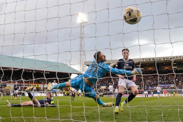 Dundee's Joe Shaughnessy scores an own goal as Rangers reduce the deficit to 2-1. (Photo by Alan Harvey / SNS Group)