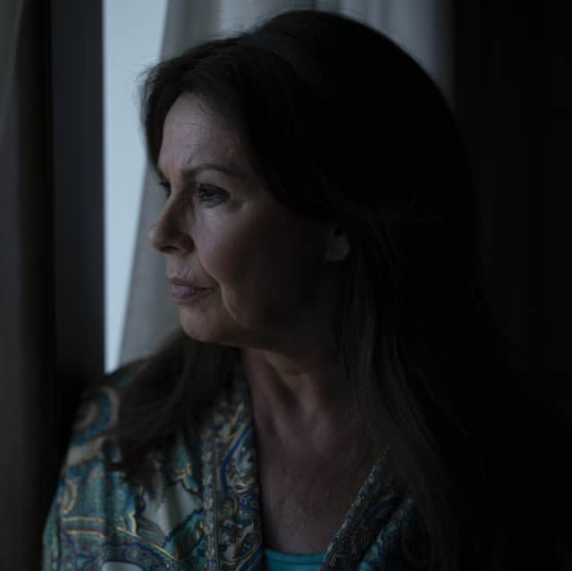 Julie Graham as Elaine Phelan in This City Is Ours