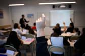 Schools need to teach pupils about basic moral values and be the antidote to toxic influencers like Andrew Tate (Picture: Loic Venance)