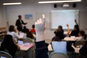 Schools need to teach pupils about basic moral values and be the antidote to toxic influencers like Andrew Tate (Picture: Loic Venance)