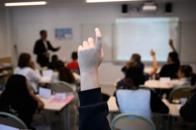 Schools need to teach pupils about basic moral values and be the antidote to toxic influencers like Andrew Tate (Picture: Loic Venance)
