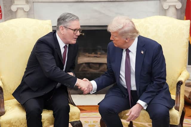 Keir Starmer is trying to maintain a façade of friendship with Donald Trump (Picture: Andrew Harnik)