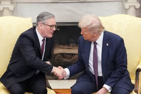 Keir Starmer is trying to maintain a façade of friendship with Donald Trump (Picture: Andrew Harnik)