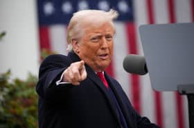 US President Donald Trump gestures as he unveils his tariffs policy at the White House