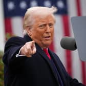 US President Donald Trump gestures as he unveils his tariffs policy at the White House