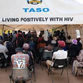 People attend an HIV clinic day in Kampala, Uganda. Following US cuts to overseas aid, Dr Bernard Etukoit said there was a lot of panic, fear, and anxiety among their clients (Picture: Hajarah Nalwadda)