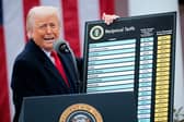 Donald Trump holds up a chart showing what tariff will be charged on imports from different countries around the world (Picture: Chip Somodevilla)