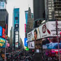 Pedestrians and cars move through the Times Square district of Manhattan, New York. Picture: Charly Triballeau/AFP via Getty Images