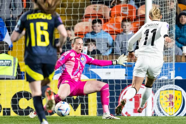 Germany's Lea Schuller (R) scores to make it 4-0 against Scotland at Tannadice.
