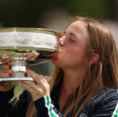 Carla Bernat Escuder kisses the trophy after winning the Augusta National Women's Amateur at Augusta National