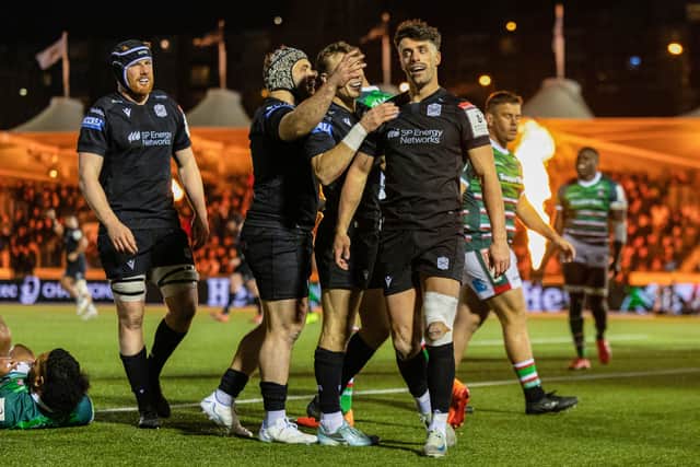 Glasgow Warriors' Adam Hastings' celebrates after scoring a second-half try against Leicester Tigers.