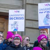 Protesters rally outside Caird Hall in Dundee in February over plans to cut hundreds of jobs at the city's university