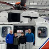 Scott and Frankie Rayner with Jack and Bruce Marbrow after being rescued by the HM Coastguard 