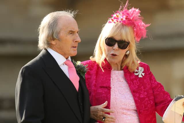 Sir Jackie Stewart and his wife Helen attending the wedding of Spice Girl Geri Halliwell and Formula 1 boss Christian Horner at St Mary's Church in Woburn, Bedfordshire, in 2015