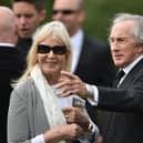 Sir Jackie Stewart and his wife Helen following the funeral of Justin Wilson at St James the Great Church in Northamptonshire in 2015