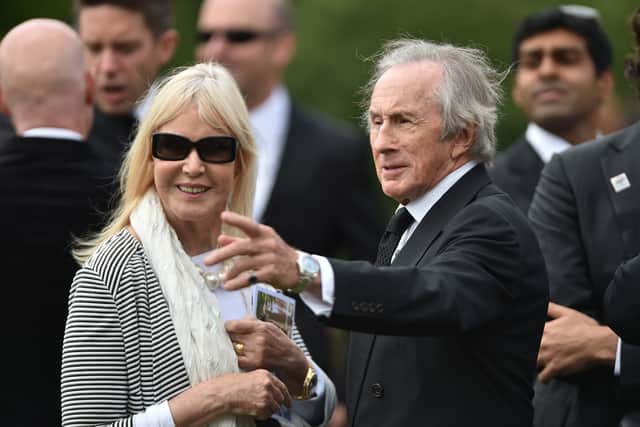 Sir Jackie Stewart and his wife Helen following the funeral of Justin Wilson at St James the Great Church in Northamptonshire in 2015