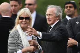 Sir Jackie Stewart and his wife Helen following the funeral of Justin Wilson at St James the Great Church in Northamptonshire in 2015