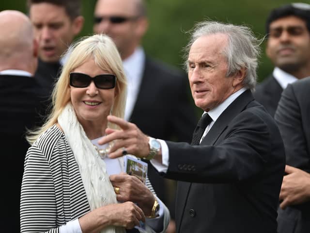 Sir Jackie Stewart and his wife Helen following the funeral of Justin Wilson at St James the Great Church in Northamptonshire in 2015
