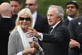 Sir Jackie Stewart and his wife Helen following the funeral of Justin Wilson at St James the Great Church in Northamptonshire in 2015