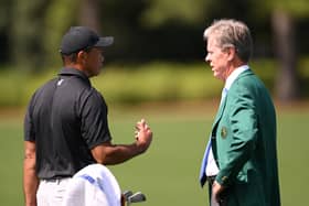 Tiger Woods speaks to Fred Ridley, Chairman of Augusta National Golf Club, prior to the 2023 Masters 