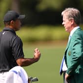 Tiger Woods speaks to Fred Ridley, Chairman of Augusta National Golf Club, prior to the 2023 Masters 