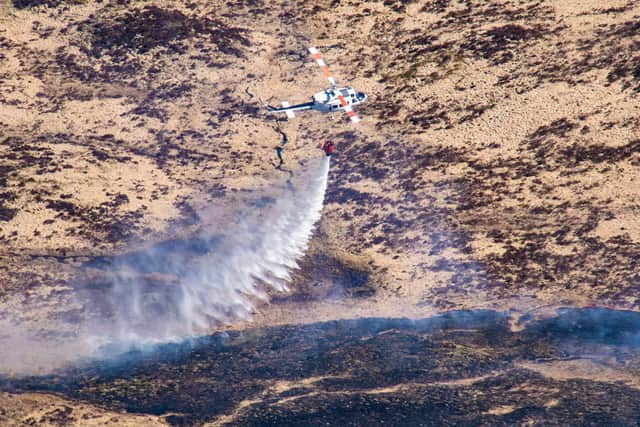 At its height, there were two fire engines at the scene assisted by two helicopters water-bombing the fire.