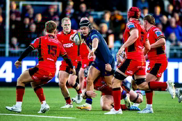 Edinburgh's Darcy Graham is challenged by Cardiff players at the Hive Stadium, on October 19, 2024. (Photo by Ewan Bootman / SNS Group)